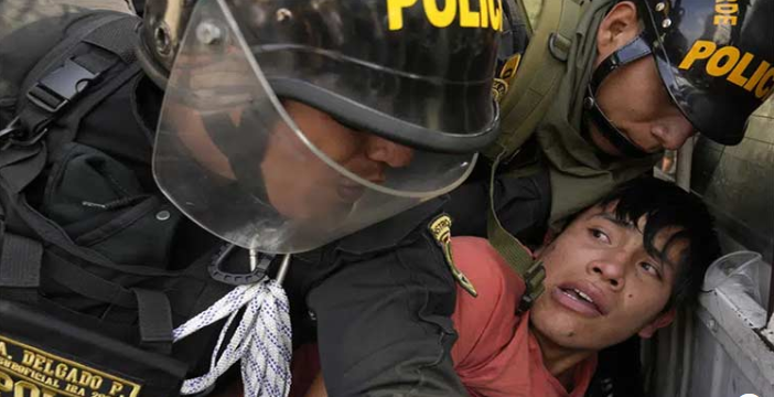 Peru police use tear gas to block protesters from marching