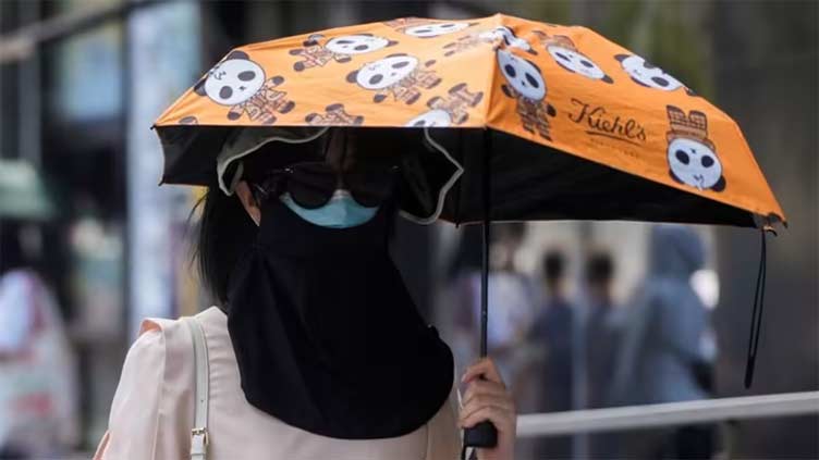 Chinese cities broil in heat, brace for more record temperatures