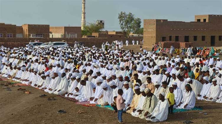 Gunfire shatters Eid prayer for peace by fed-up Sudanese